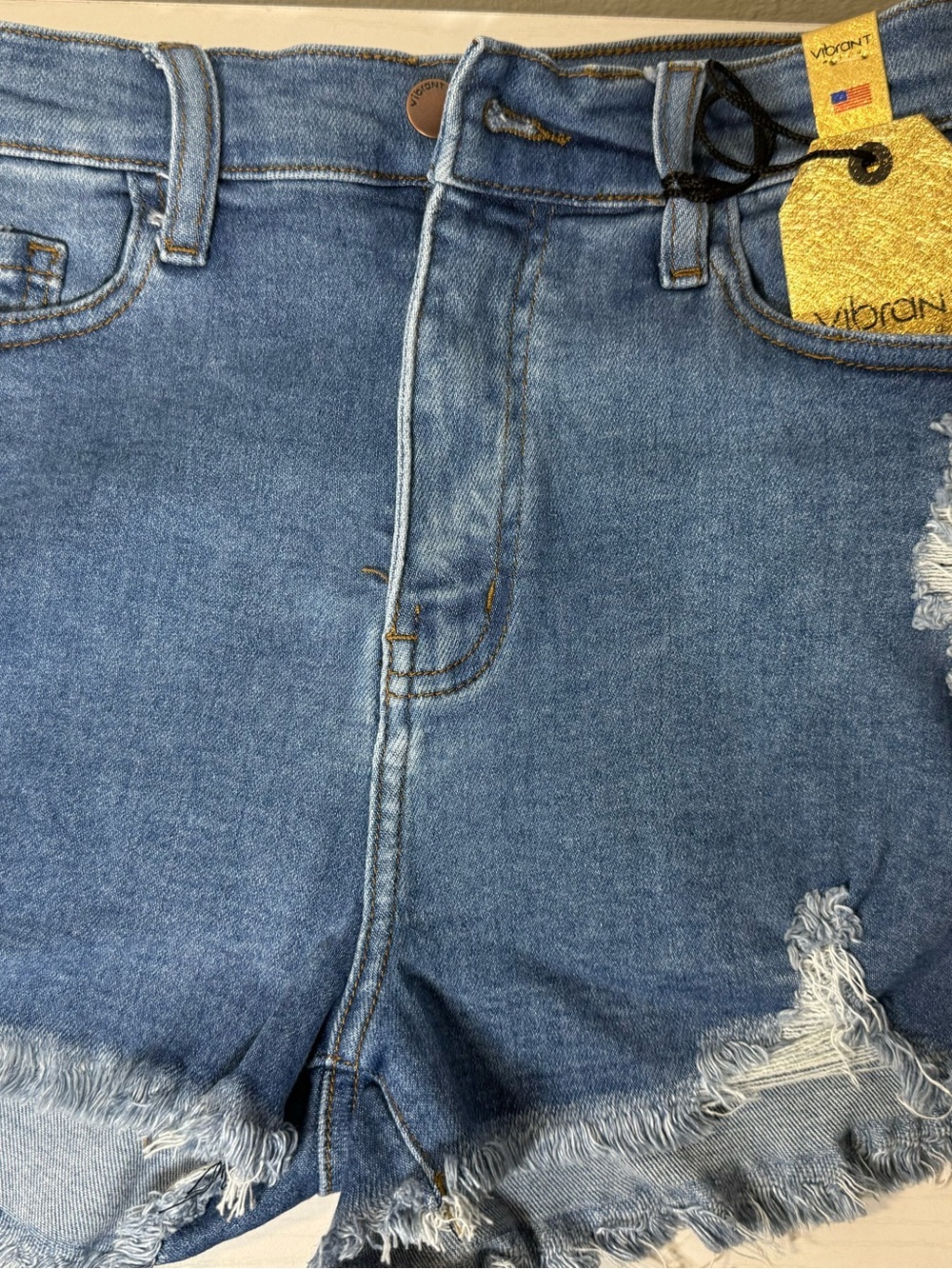 Vibrant Light Blue Distressed Denim Shorts